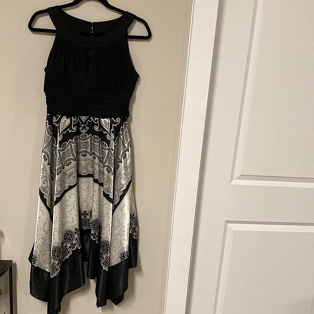 Size 10 used dress in excellent condition with no defects! Beautiful dress!